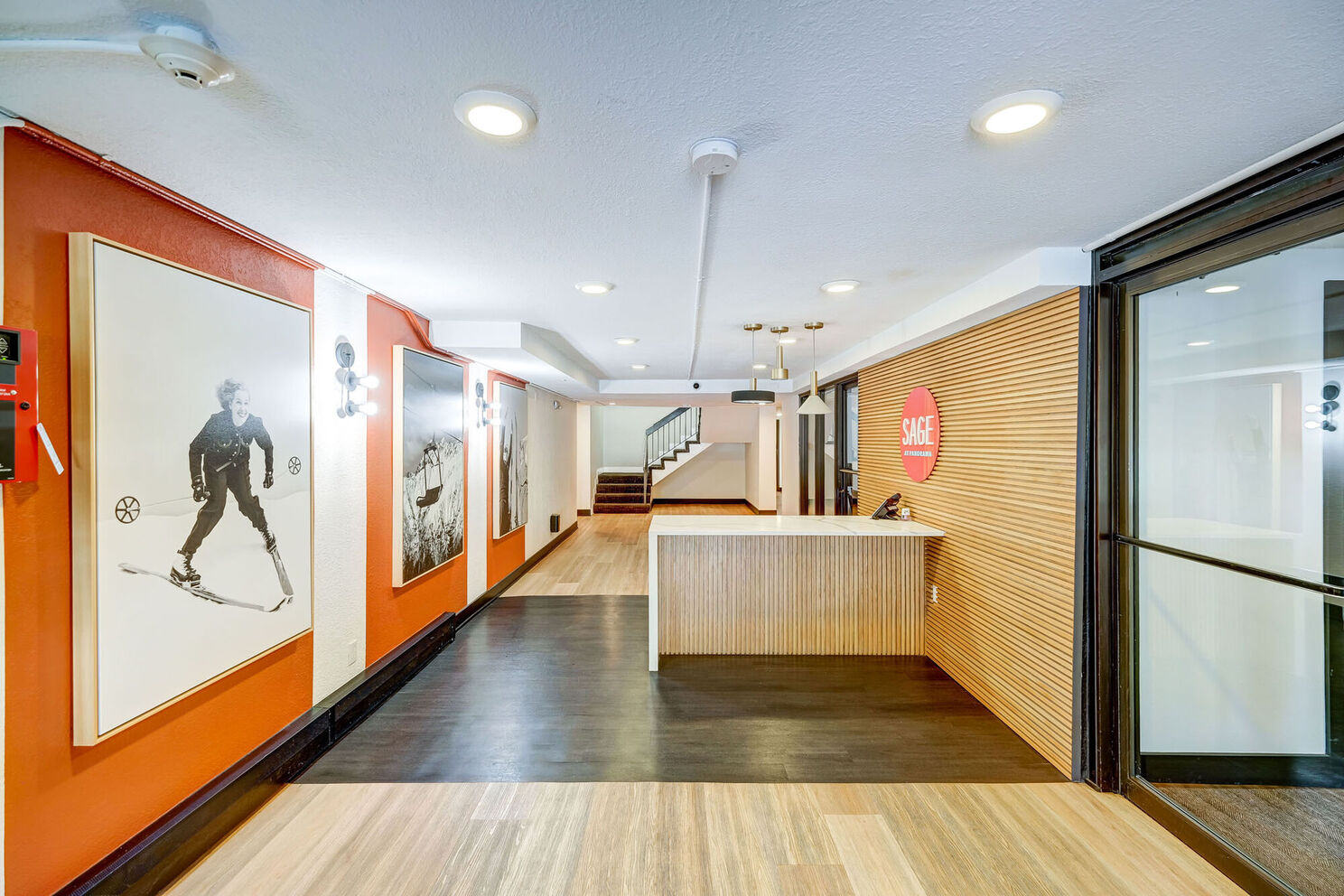 leasing office with decor and large wood slat wall
