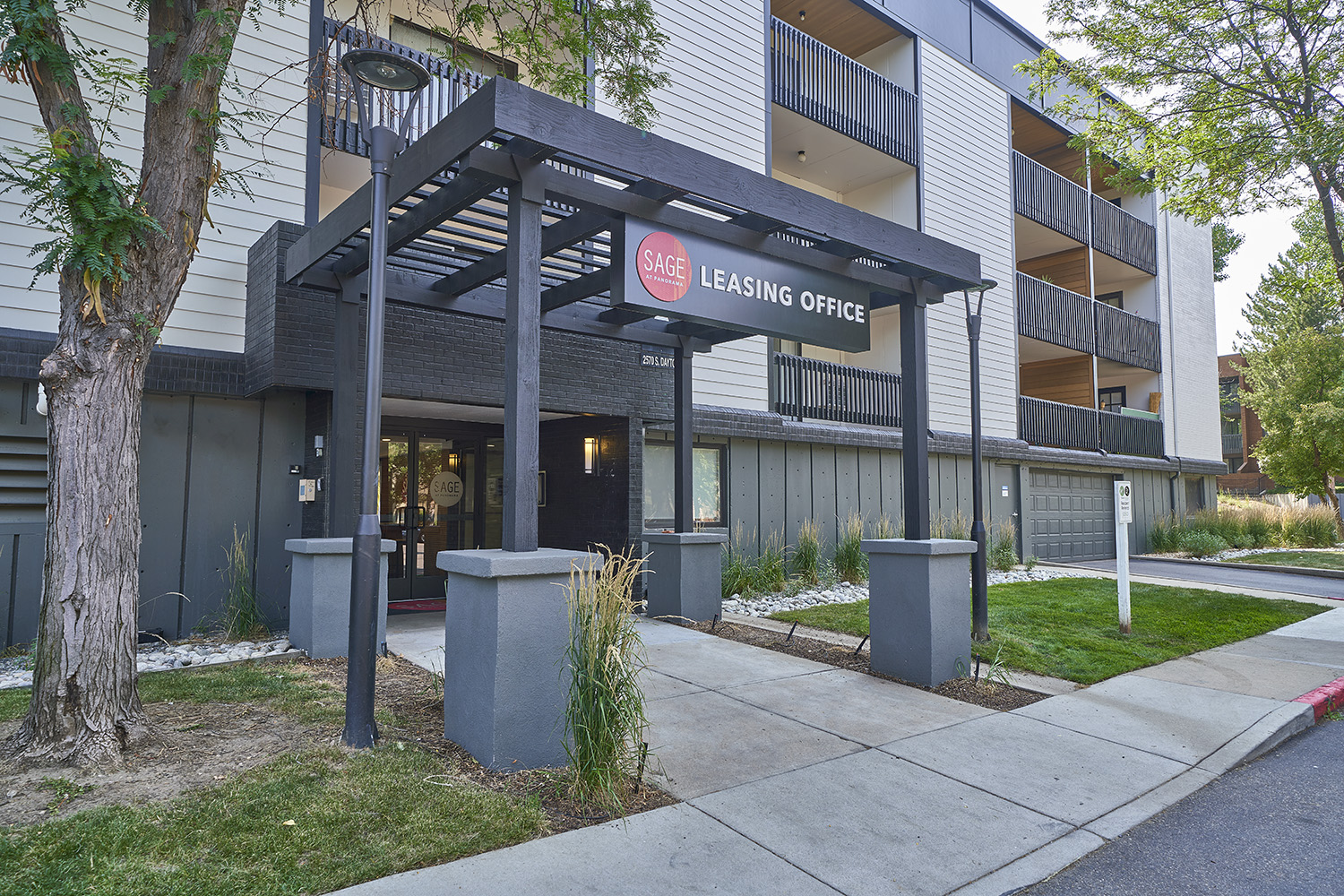 leasing office with decor and large wood slat wall