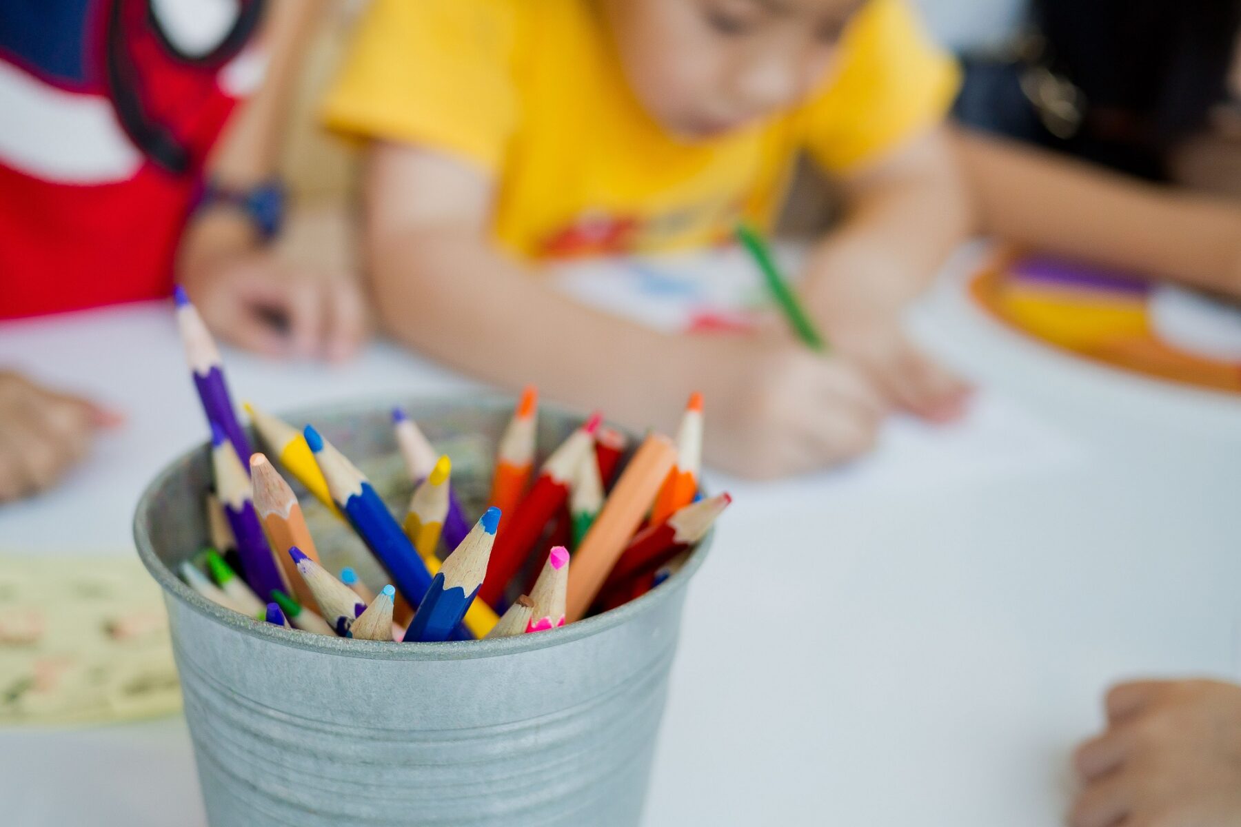 young boy coloring